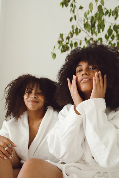 Two Women Wearing Facia Patches